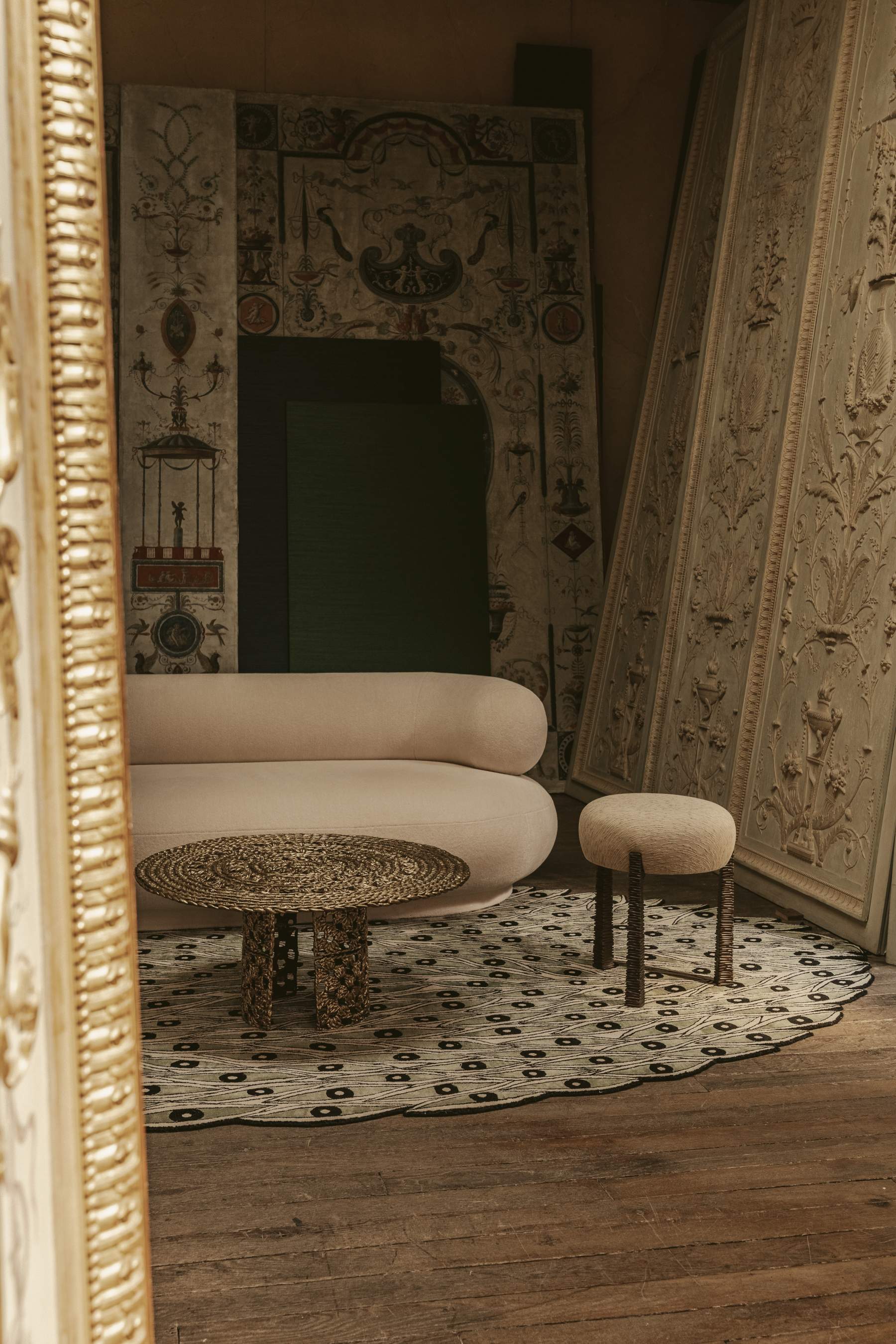Gilded panelled room with a braided rug. Invisible Collection with Mobilier national and Feau; photo Rodrigo Rize
